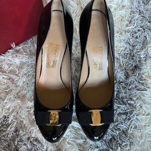 Salvatore Ferragamo Black High Heel Pumps with Gold Ornament